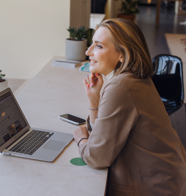 Woman sitting at desk.